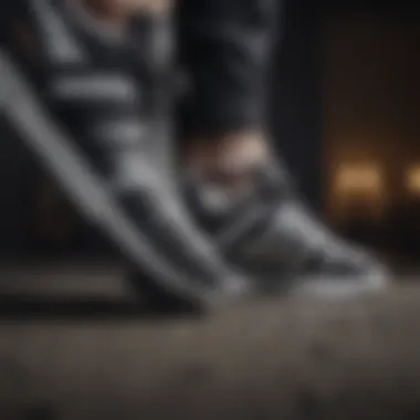 Close-up of the iconic black and white stripes on Adidas shoes
