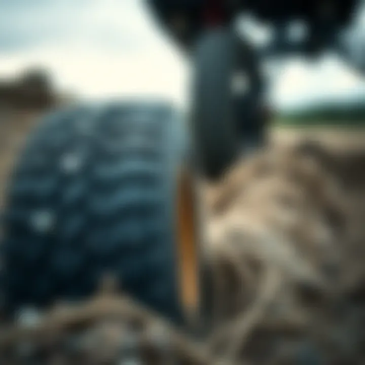 Close-up of rally tires on rugged terrain
