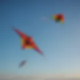 A colorful custom kite soaring in a clear blue sky, demonstrating unique design and craftsmanship.