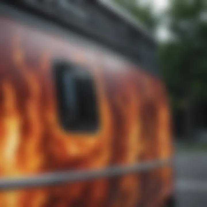 Close-up of vibrant fire flame graphics on a van