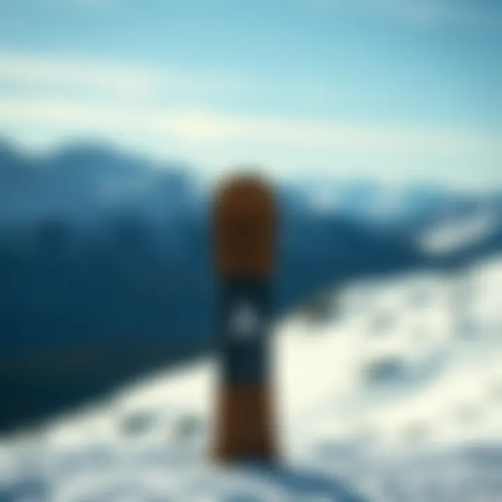 A scenic mountain backdrop with the Arbor A-Frame snowboard placed against it, symbolizing adventure