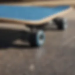 Close-up view of blue grip tape on a skateboard deck, highlighting texture and adhesion.