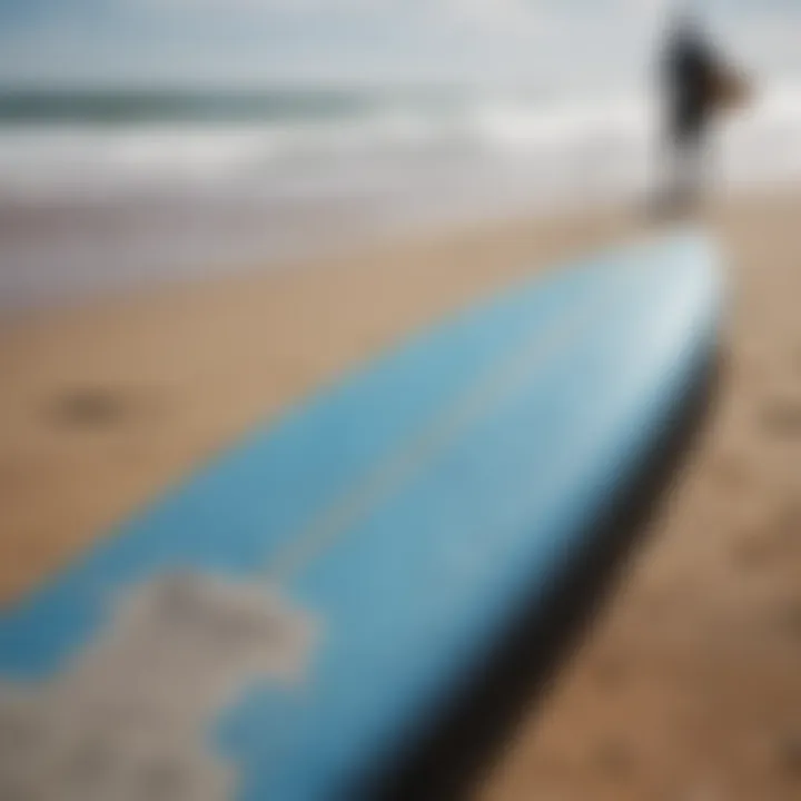 Blue grip tape applied on a surfboard, showcasing its effectiveness in water sports.