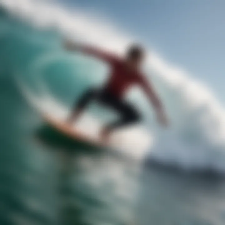 An action shot of a surfer riding a shortboard on a wave