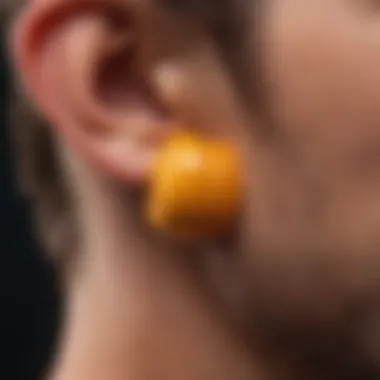 A close-up view of ear plugs showcasing their unique designs.