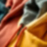 A close-up view of diverse zip-up hoodie fabrics suitable for extreme sports.