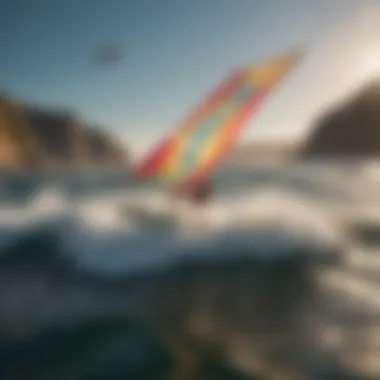 Gliding Across the Waves in Mackite Boarding A mackite boarder gliding over water with a vibrant kite