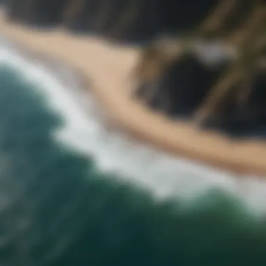 An aerial view of Malibu First Point highlighting the coast and surf breaks.