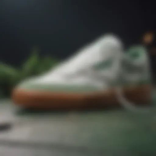 Close-up of Reebok Classic Club C Vintage Sneakers showcasing chalk and green colorway.