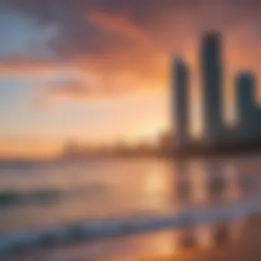 A panoramic view of Surfers Paradise beach at sunset, showcasing the vibrant colors of the sky reflecting on the water.