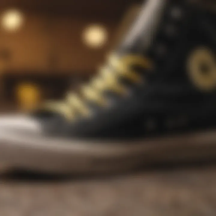 Close-up of black and yellow Chuck Taylor detailing and material composition