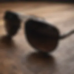 Close-up of super dark sunglasses on a wooden surface