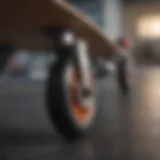 A close-up of skateboard training wheels attached to a board