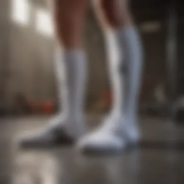 White Adidas Socks with Sports Gear Collection of white Adidas socks alongside extreme sports gear.
