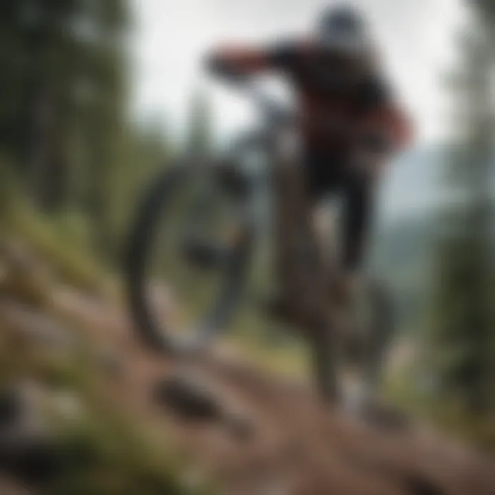 Rider performing maintenance on a downhill mountain bike