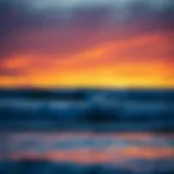 A stunning sunset over a beach with surfers catching waves