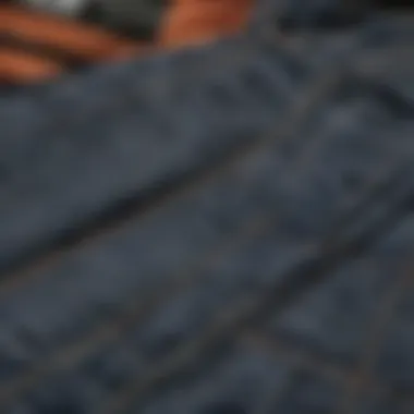 A detailed shot of the stitching and design elements of Dickies checkered overalls