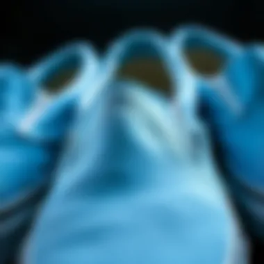 Close-up of light blue Vans slip-ons showcasing the texture and design