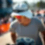 Stylish athlete wearing a white Oakley hat during a skateboarding event