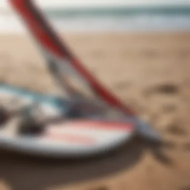 Close-up view of wind surfing gear laid out on the beach