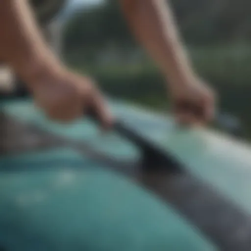 Close-up of an inflatable paddle board showing a puncture repair