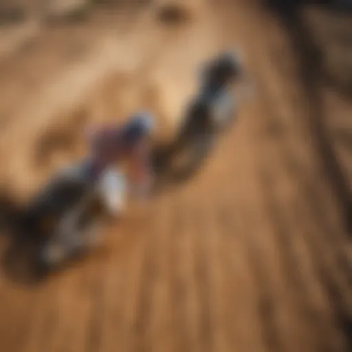 Aerial view of a motocross track with riders in action