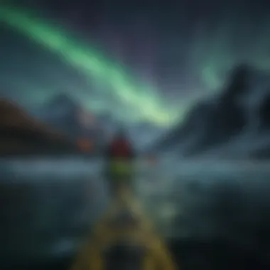 Kayak paddling through icy waters under the northern lights