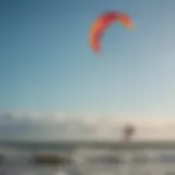 Kite surfing at Folly Beach showcasing vibrant kites against a clear sky