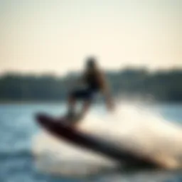 A thrilling moment of a rider executing a jump on a kneeboard