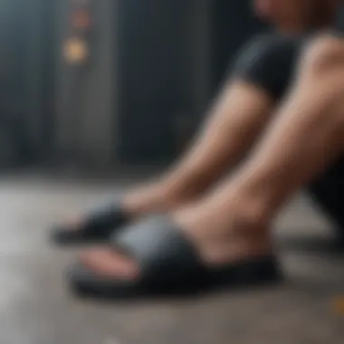 Athlete Relaxing in Nike Padded Slides Athlete wearing Nike padded slides after a sports activity