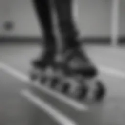 Stylish black and white rollerblades on a skate park ramp
