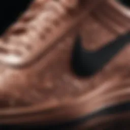 Close-up view of Nike Rose Gold Black shoes highlighting intricate design details