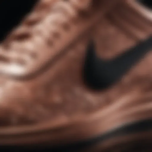 Close-up view of Nike Rose Gold Black shoes highlighting intricate design details