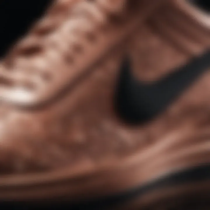 Close-up view of Nike Rose Gold Black shoes highlighting intricate design details