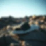 Fashionable Appeal of Nike Slide with Strap Stylish Nike Slide with Strap on a rocky surface