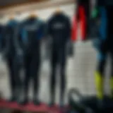 A collection of O'Neill wetsuits displayed attractively