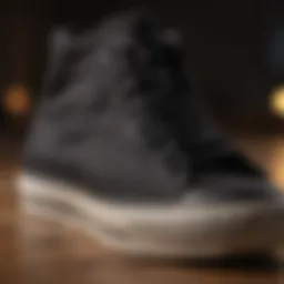 Close-up of black Converse showcasing unique material details