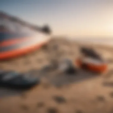 Close-up of high-quality kite surfing gear laid out on the beach, highlighting essential equipment.