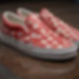 Close-up view of red checkered slip-on Vans showcasing their unique pattern