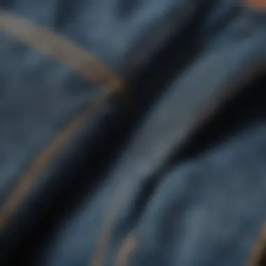 Close-up of fabric texture of relaxed fit jeans