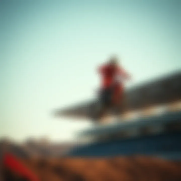 Dynamic action shot of a rider executing a jump on the track