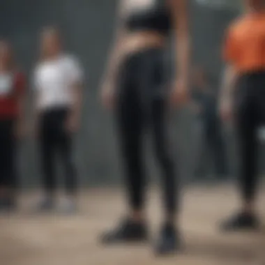 Cultural Impact of Adidas Pants in Sports Group of athletes wearing all black Adidas pants in a dynamic outdoor environment.