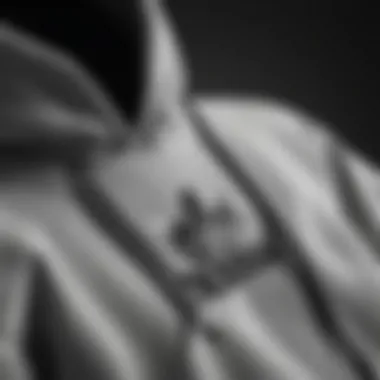 Close-up of the fabric and design details of the Adidas hoodie