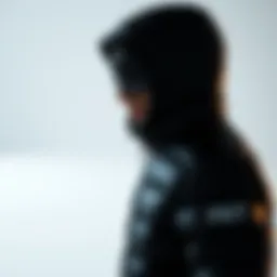 Stylish black hooded puffer jacket showcased on a minimalist backdrop