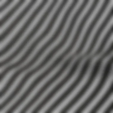 Close-up of fabric texture showcasing fine black stripes on white