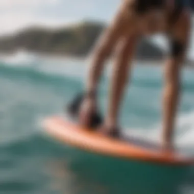 Wearing Bodyboard Fins Correctly Person demonstrating the proper technique of wearing bodyboard fins