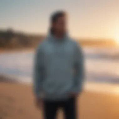 Stylish Surf Changing Hoodie on the Beach A stylish surf changing hoodie displayed on a sandy beach