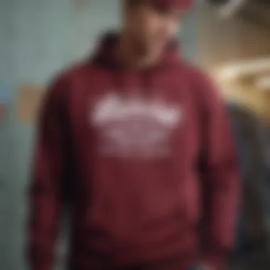 Streetwear ensemble featuring the maroon Vans sweatshirt styled with accessories