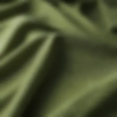 Close-up of the fabric texture of a green tea shirt, highlighting its unique material.