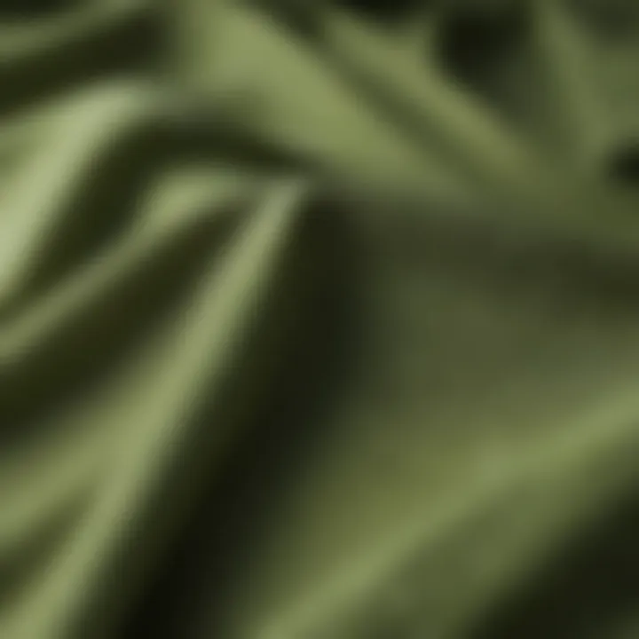 Close-up of the fabric texture of a green tea shirt, highlighting its unique material.